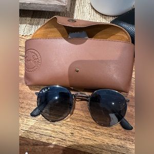 Round, Lennon-style Ray-Ban sunglasses